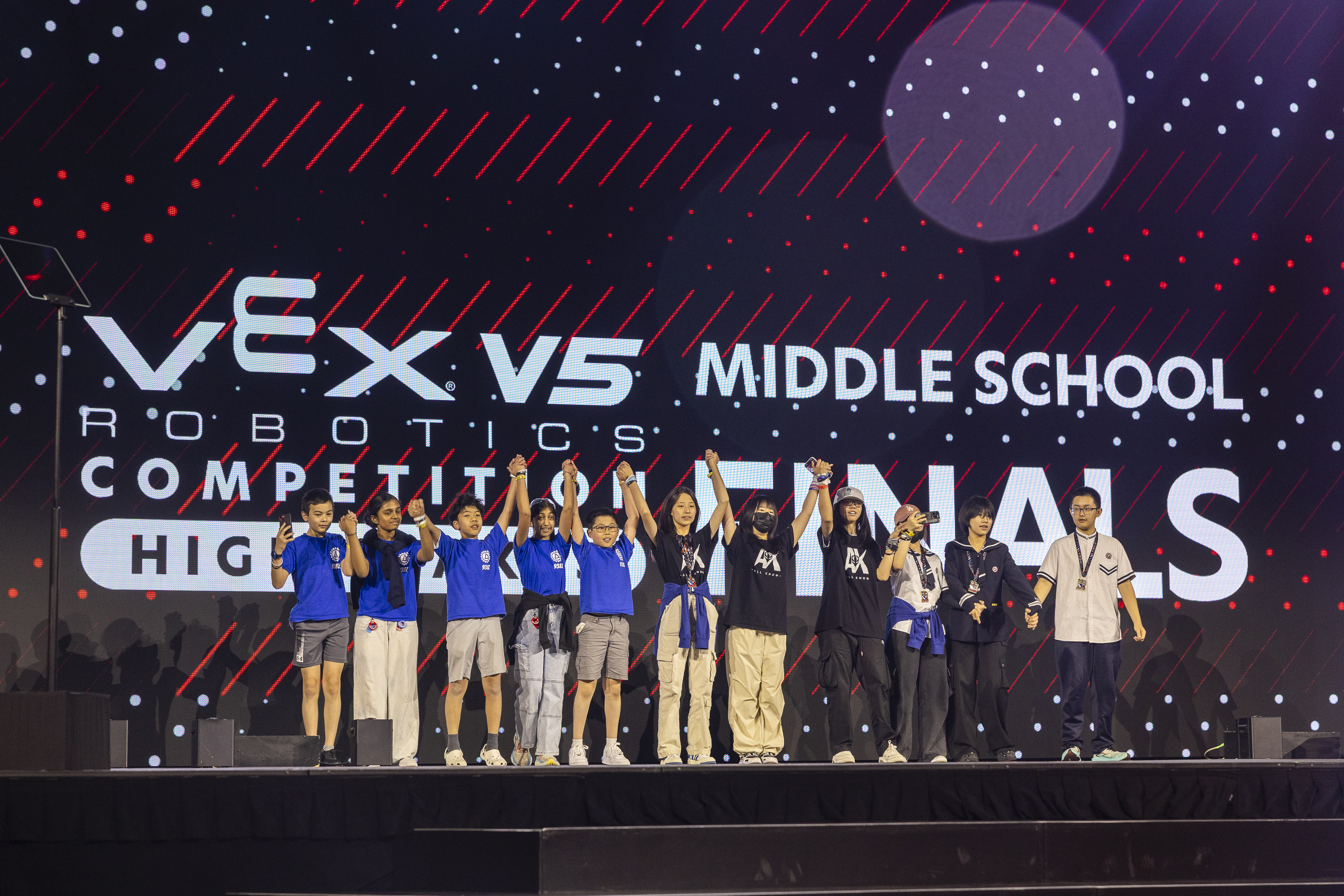 This is an image of a glossy skull in front of a wall of text that reads heads.