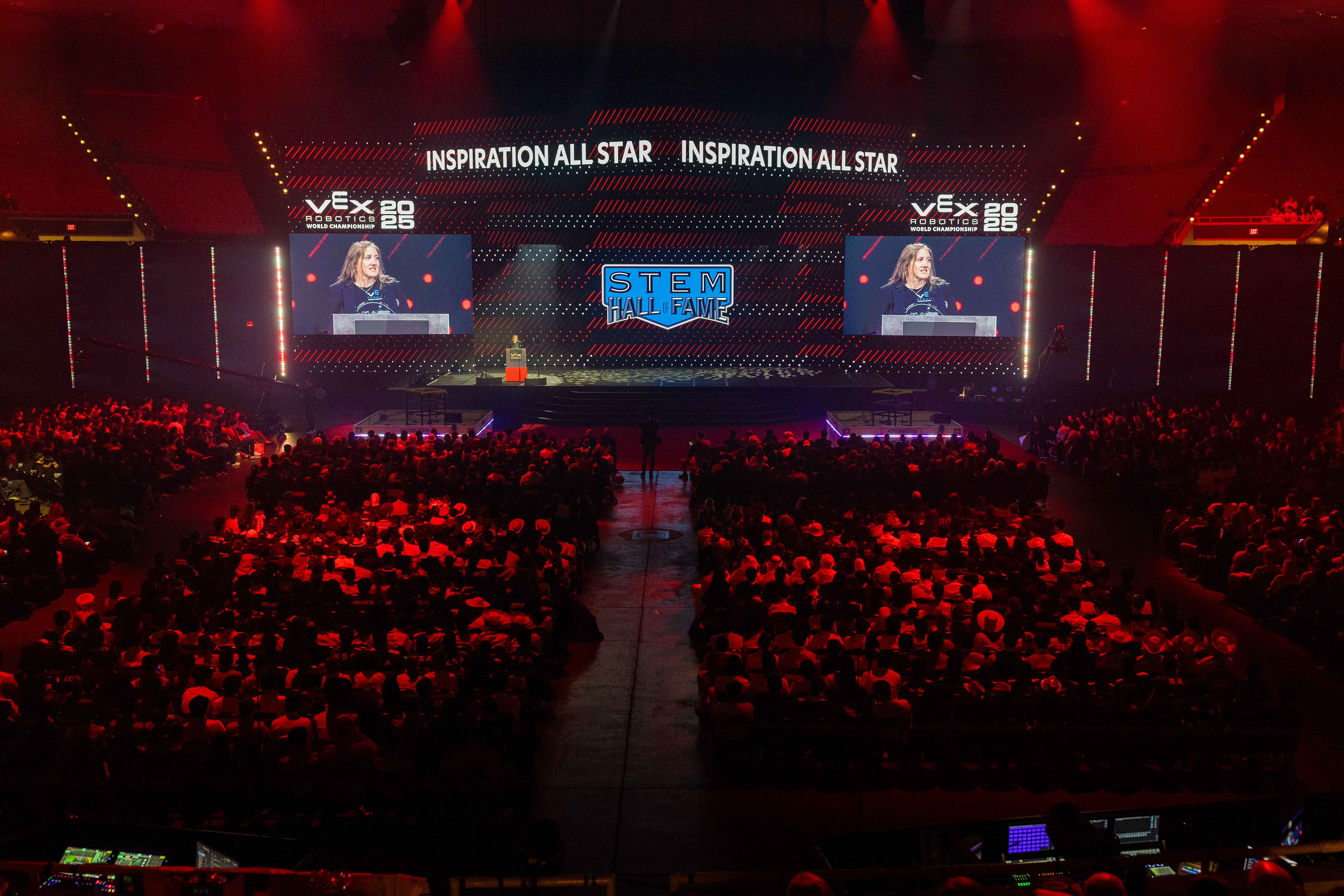 This is an image of a glossy skull in front of a wall of text that reads heads.