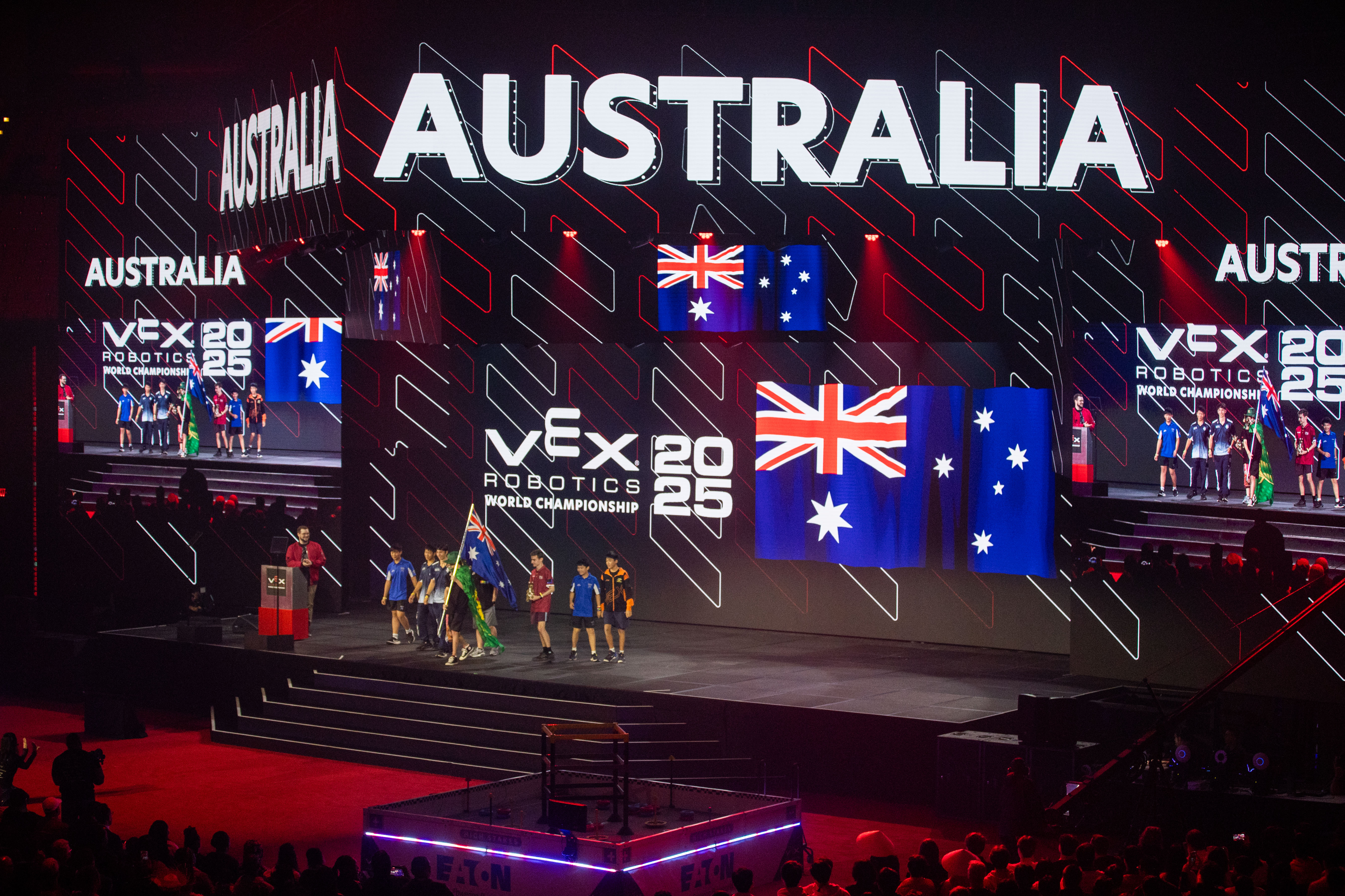 This is an image of a glossy hedgehog in front of a wall of text that reads heads.